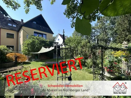 Hausansicht / Garten - Haus kaufen in Nürnberg - WOW!!! Zweifamilien-Doppelhaushälfte mit herrlich großem Gartengrundstück in Nürnberg-Ziegelstein