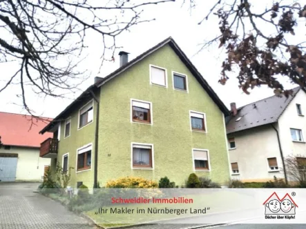 Außenansicht Nordwest - Wohnung kaufen in Ottensoos - Viel Platz zum fairen Preis! 4-Zimmer-ETW mit Balkon und 2 KFZ-Stellplätzen im Zentrum von Ottensoos