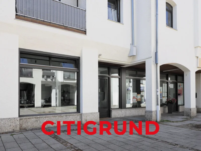 Außenansicht I Gewerbeeinheit - Büro/Praxis kaufen in Unterhaching - Unterhaching - Vermietete Laden-/Bürofläche inmitten der Fußgängerzone - Investment!