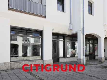 Außenansicht I Gewerbeeinheit - Büro/Praxis kaufen in Unterhaching - Unterhaching - Vermietete Laden-/Bürofläche inmitten der Fußgängerzone - Investment!