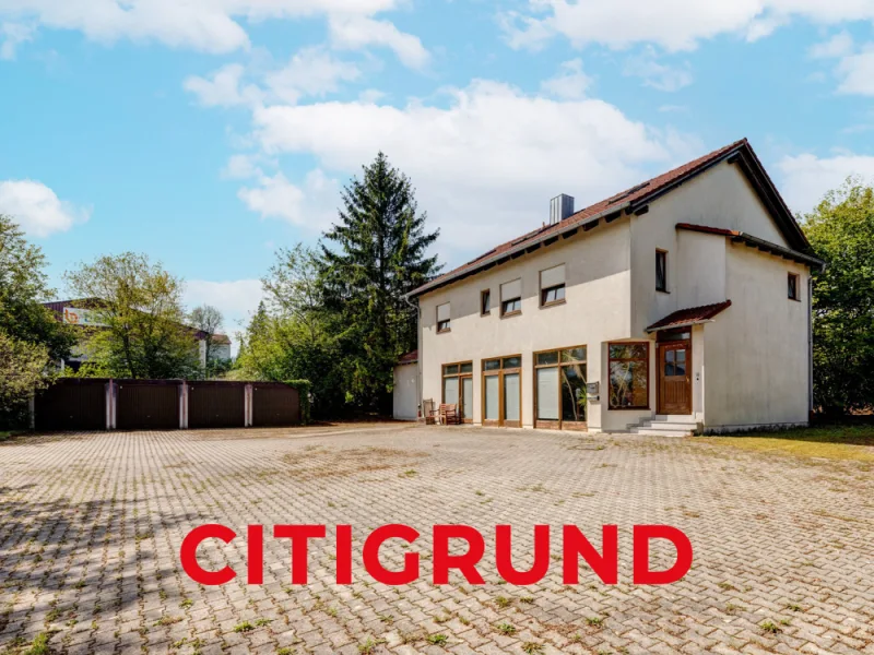 Wohn-/Geschäftshaus - Haus kaufen in Taufkirchen - Taufkirchen Vils/Bei Landshut - Vielseitig nutzbare Gewerbe-/Wohneinheit auf großzügigem Grundstück