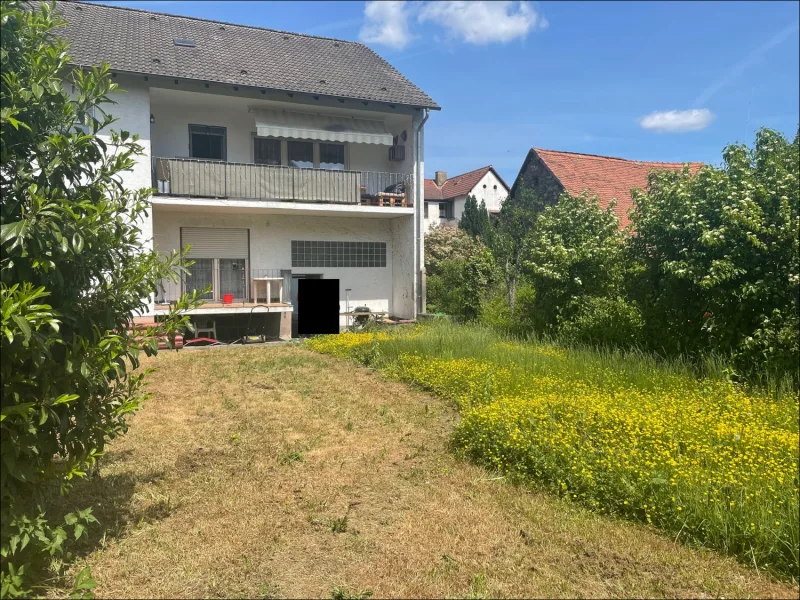 Garten - Haus kaufen in Aschaffenburg / Damm - 6 Wohneinheiten in AB-Damm, voll vermietet