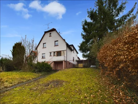 Gartenansicht - Haus kaufen in Hösbach - Zwei mal Zuhause: Geräumige Doppelhaushälften mit viel Potenzial