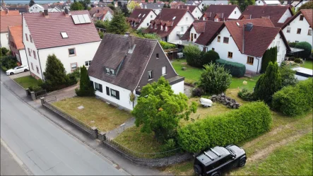 Ansichten - Haus kaufen in Großostheim - Sanierungsbedürftiges Einfamilienhaus mit großem Garten – Gestalten Sie Ihr Traumhaus!