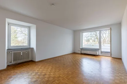 Wohnzimmer - Wohnung kaufen in München - POTENZIAL! 2-Zimmer-Wohnung in zentraler Harlachinger Lage