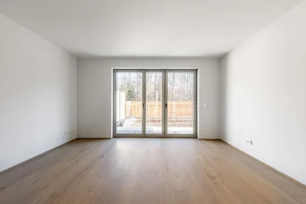 Wohnen - Wohnung kaufen in München - SINGLE // Barrierefreie 1-Zimmer-Wohnung mit Terrasse und Gartenanteil - Neubau/Erstbezug