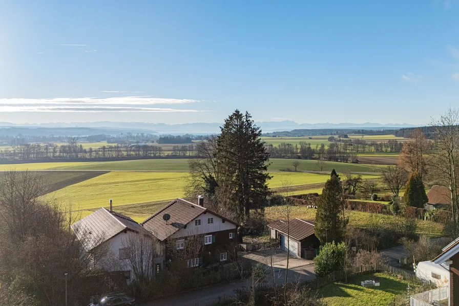 Aussicht - Grundstück kaufen in Zankenhausen - TRAUMHAFTES BAUGRUNDSTÜCK MIT SEE- UND BERGBLICK IN ZANKENHAUSEN