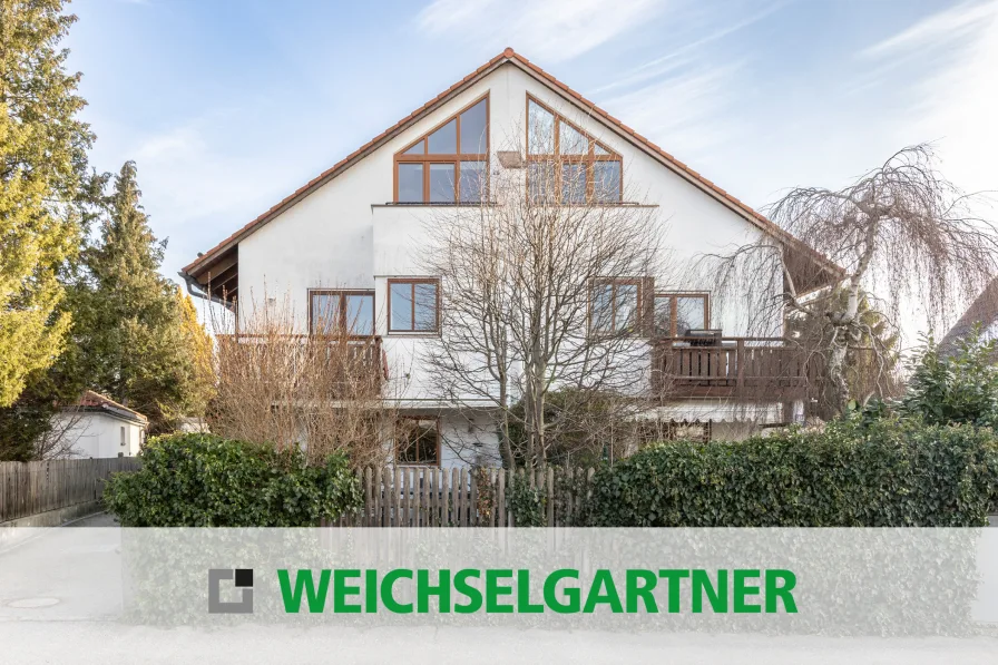 Im Alleinauftrag - Wohnung kaufen in München - Vermietete Dachgeschosswohnung mit zwei Balkonen in ruhiger und beliebter Wohngegend