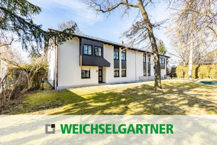 Im Alleinauftrag - Wohnung kaufen in München - Sanierungsbedürftige Maisonette-Gartenwohnung mit TG-Einzelstellplatz in beliebter Wohnlage