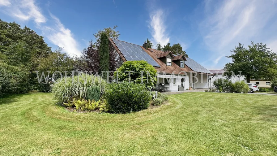 Aussenansicht - Haus kaufen in Oberding - Solides EFH mit Einliegerwohnung, Doppelgarage und großem Garten