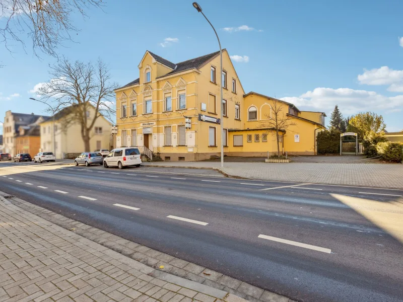 Titelbild - Grundstück kaufen in Bönen - Zentral gelegenes Baugrundstück in Bönen mit denkmalgeschütztem Wohn- und Geschäftshaus und Garagen