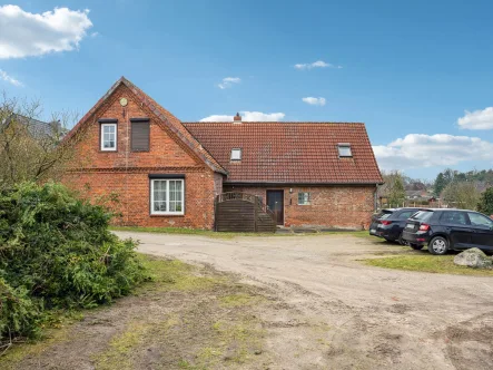 Titelbild - Haus kaufen in Kirchlinteln - Zweifamilienhaus mit Option zum Einfamilienhaus in Armsen!