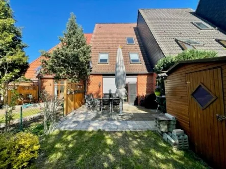 Titelbild - Haus kaufen in Zossen - Reihenmittelhaus in gepflegter Wohnanlage - Südwest-Terrasse mit neuer Heizung