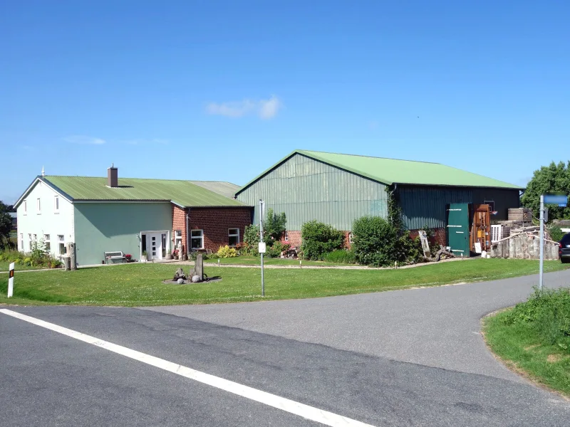 Titelbild - Haus kaufen in Friedrichskoog - Beste LAGE, guter ZUSTAND, schöner CHARAKTER: Gepflegter Resthof in Friedrichskoog / Nordsee