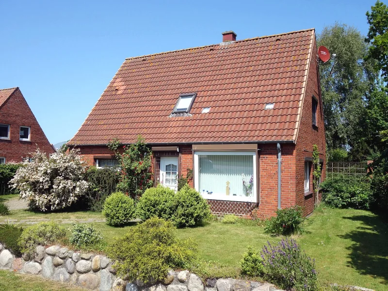 Titelbild - Haus kaufen in Friedrichskoog - Modernisiertes Einfamilienhaus mit Nebenhaus in ruhiger Lage in Friedrichskoog / Nordsee