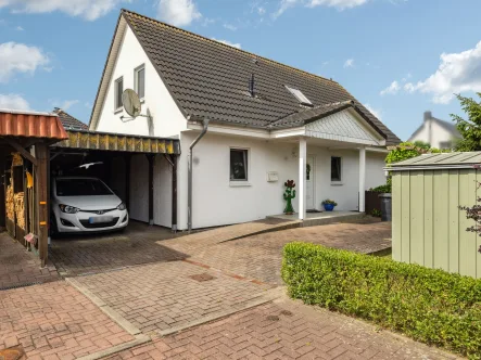 Titel  - Haus kaufen in Bartenshagen-Parkentin - Schönes Einfamilienhaus mit Süd-West Terrasse und Carport im idyllischen Parkentin