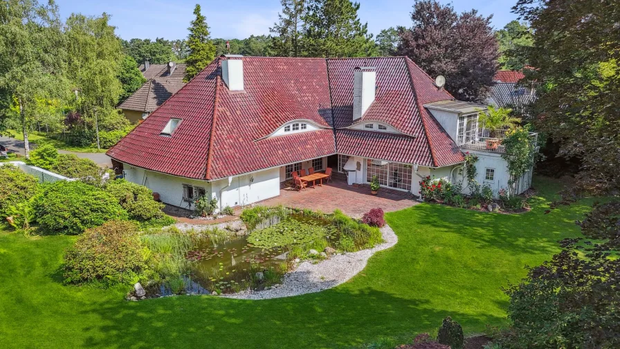 Titelbild - Haus kaufen in Ahausen - Eleganz und Entspannung: Ihr Luxuriöses Einfamilienhaus mit parkähnlichem Garten und Wellnessbereich