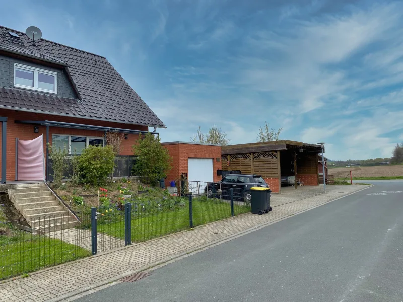 Ansicht - Haus kaufen in Gielde - Gepflegte Doppelhaushälfte mit ca. 140 m² Wohnfläche in Gielde