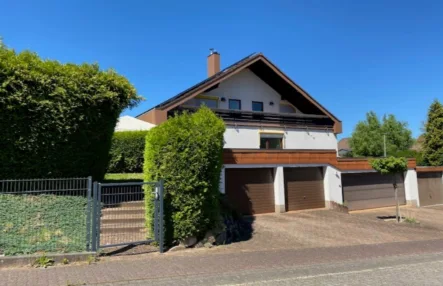 Titelbild - Haus kaufen in Riegelsberg - Sehr schönes Einfamilienhaus in bevorzugter Wohnlage in Riegelsberg