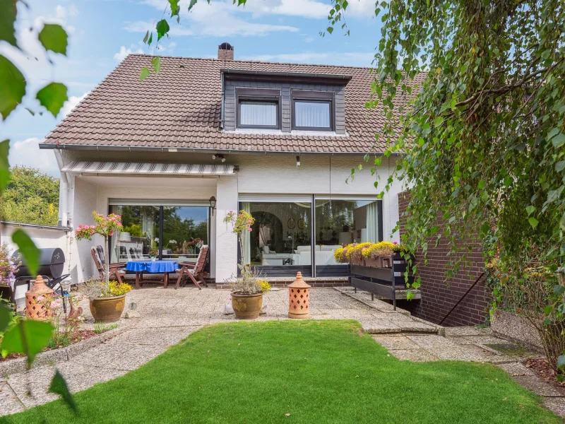 Gepflegte  Doppelhaushälfte - Haus kaufen in Bad Münder am Deister - Gepflegte 4-Zimmer Doppelhaushälfte mit idyllischem Garten in Bad Münder 