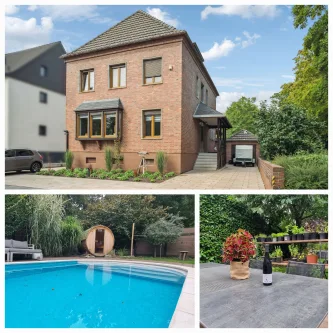 Titelbild - Haus kaufen in Düren - Düren Lendersdorf - Freistehendes Stadthaus mit Pool, Sauna und modernem Komfort