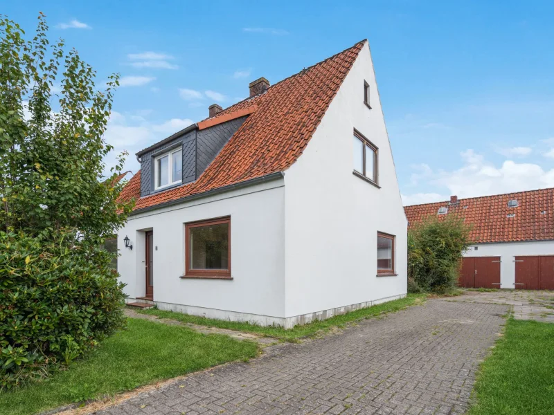 Außenbild - Haus kaufen in Weyhe/Sudweyhe - Leerstehendes Ein-/ oder Zweifamilienhaus mit tollen Grundstück in Sudweyhe!