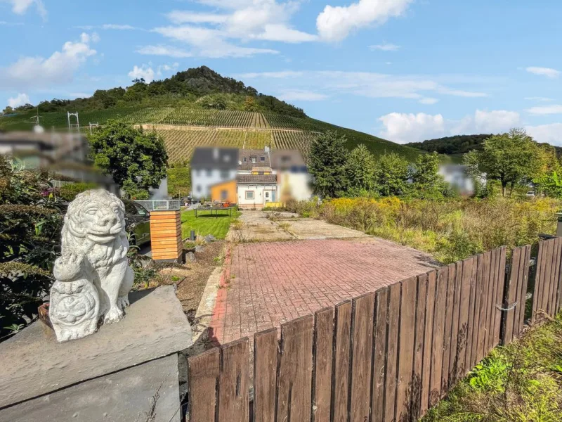 Rückansicht - Haus kaufen in Bad Neuenahr - Handwerker aufgepasst: Reihenmittelhaus mit Potenzial und sonnigem Garten in Heppingen