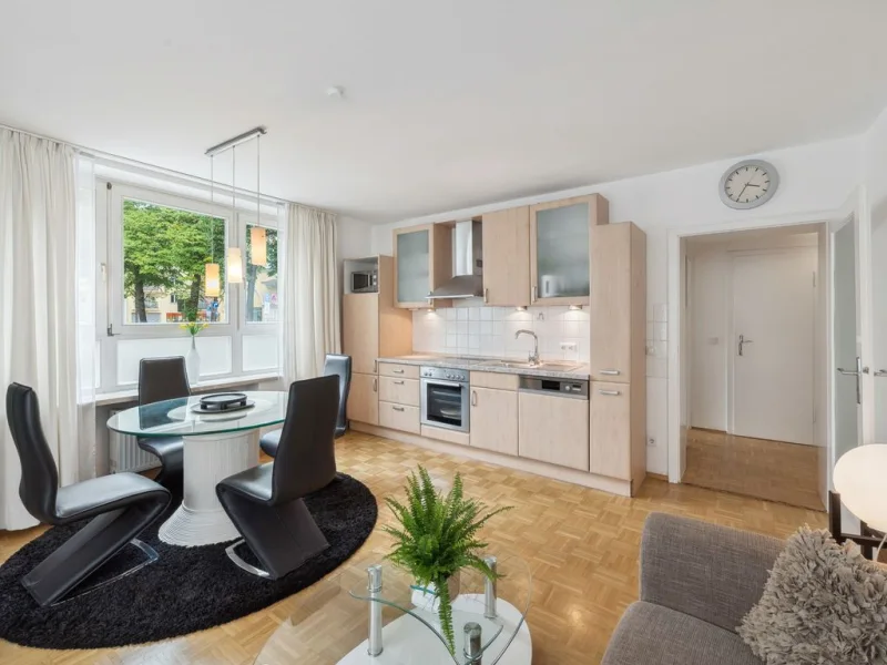Wohnbereich - Wohnung kaufen in München - Bezugsfrei! Sehr schöne 2-Zimmer-EG-Wohnung in attraktiver Lage in München-Schwabing/West