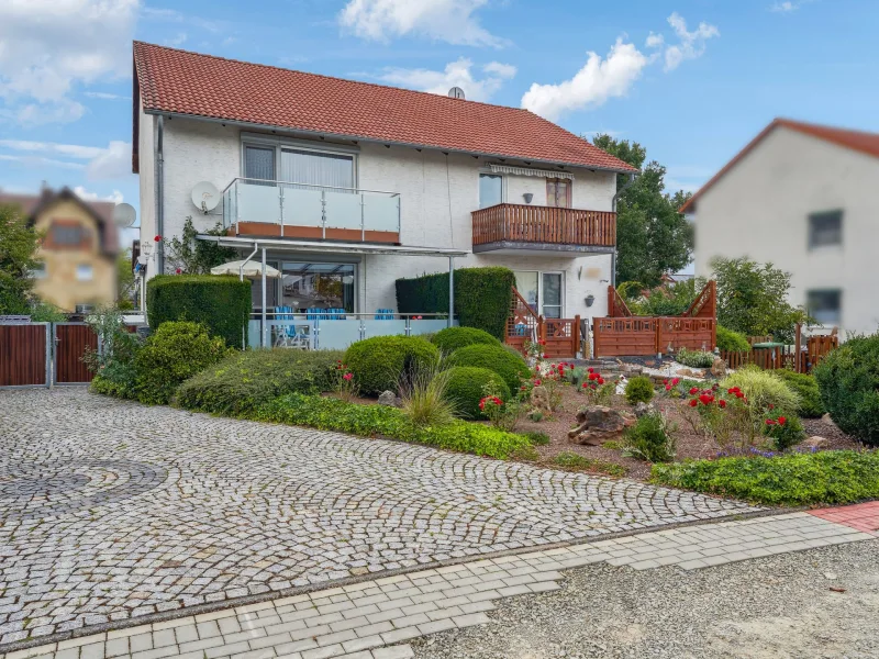 Außenansicht - Haus kaufen in Espenau - DHH mit Sauna und großem Garten in Espenau