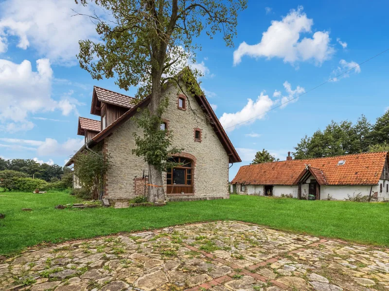 Gesamtansicht - Haus kaufen in Bissendorf - Seltene Gelegenheit! Einfamilienhaus auf Erbpachtgrundstück in Alleinlage von Bissendorf