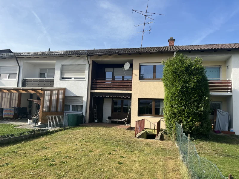 Gartenansicht - Haus kaufen in Teising - Geräumiges Reihenmittelhaus in Teising