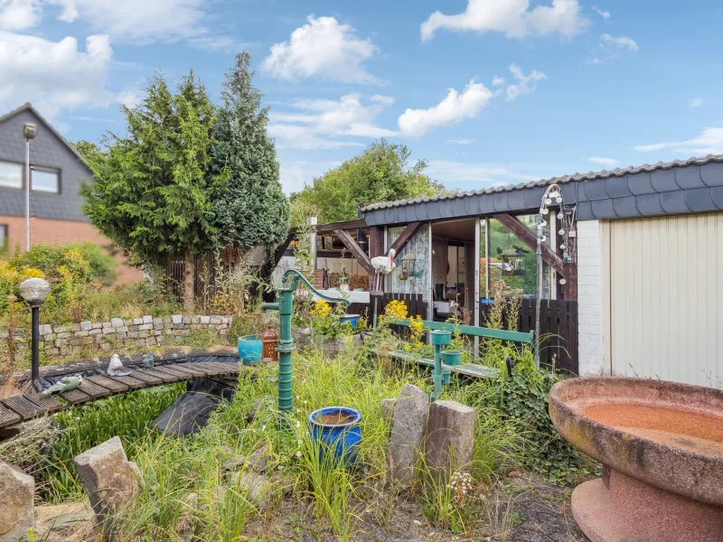 Garten - Haus kaufen in Ratingen - Zweifamilienhaushälfte mit Garten, Garage und Werkstatt in beliebter Lage von Ratingen-Lintorf