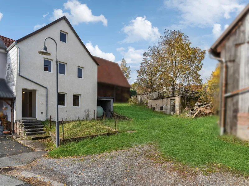 Titelbild - Haus kaufen in Burkardroth - Saniertes Einfamilienhaus in ruhiger Lage in Burkardroth