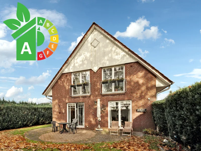 Titelbild - Haus kaufen in Tostedt - Ideal für Familien: Gepflegtes Einfamilienhaus mit neuesten Energiestandards im Herzen von Tostedt