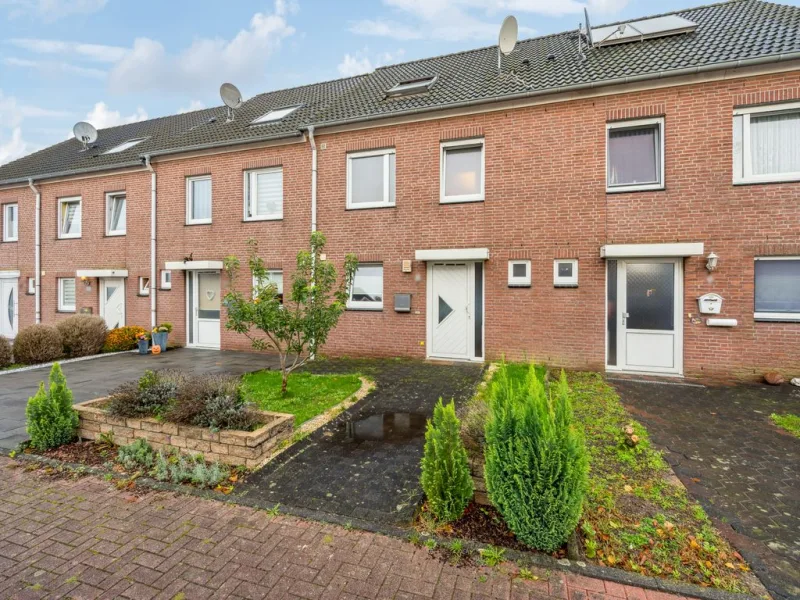 Ansicht - Haus kaufen in Nettetal - Tolles Reihenhaus mit Pool und Garage in Nettetal-Breyell