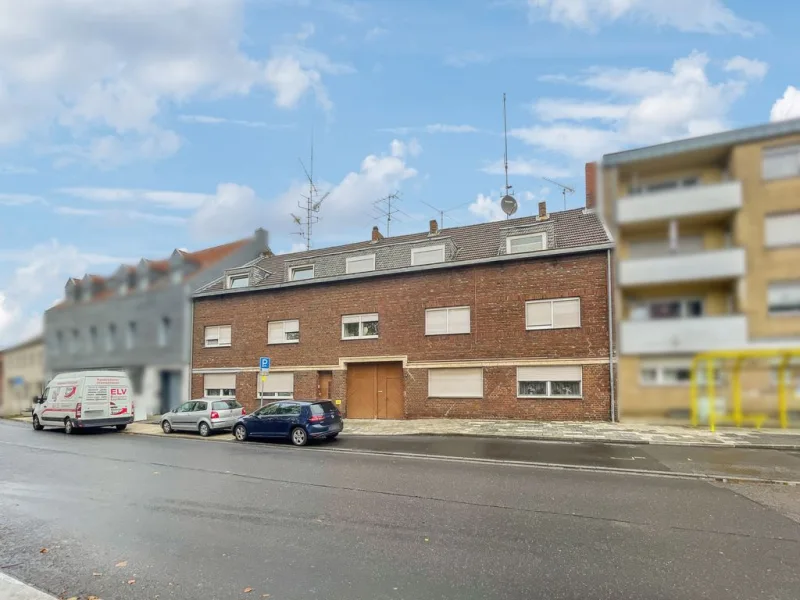 Außenansicht I - Haus kaufen in Übach-Palenberg - Top Kapitalanlage mit freiem Baugrundstück und viel Potenzial in bevorzugter Lage von Übach