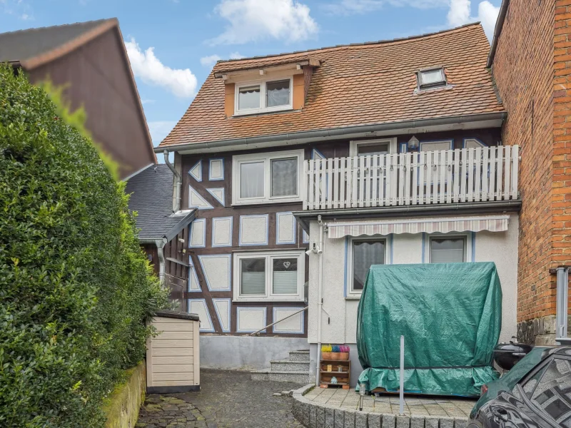 Titelbild - Haus kaufen in Ebsdorfergrund - Kleines Fachwerkhaus inkl. separatem Gartengrundstück sucht neue Eigentümer