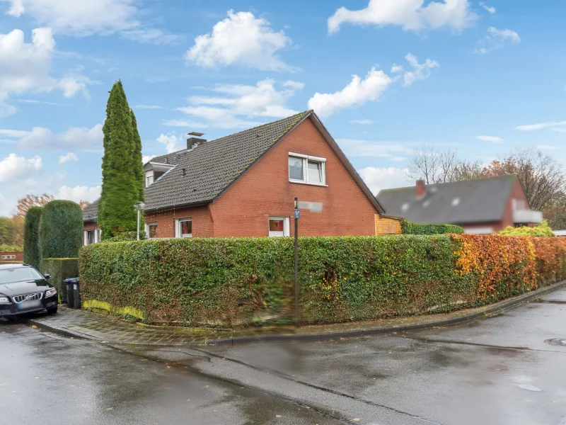 Titelbild - Haus kaufen in Münster - Attraktives Zweifamilienhaus in ruhiger Sackgassenlage in Münster