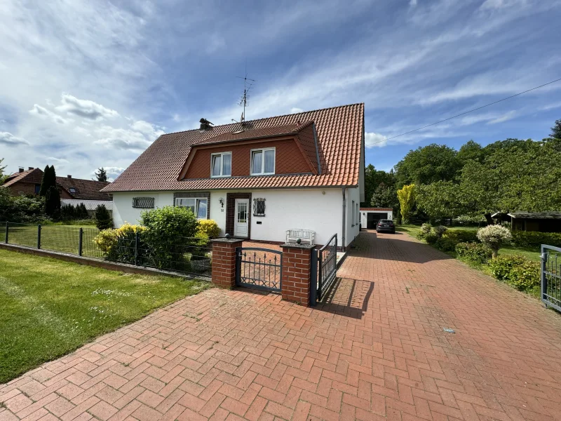 Titelbild - Haus kaufen in Kirchlinteln - Solides Einfamilienhaus mit Potenzial in Kirchlinteln 