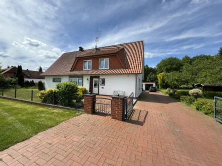 Titelbild - Haus kaufen in Kirchlinteln - Solides Einfamilienhaus mit Potenzial in Groß Sehlingen 