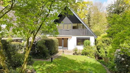 Titel - Haus kaufen in Bremen - Vielseitiges Wohnen in Borgfeld: Geräumiges Zwei- oder Einfamilienhaus mit Garage und Carport