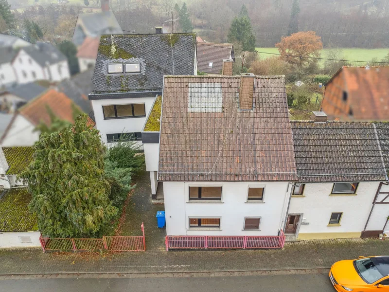 Titelbild - Haus kaufen in Bad Camberg - Bad Camberg OT - Drei Wohnhäuser auf einem Grundstück