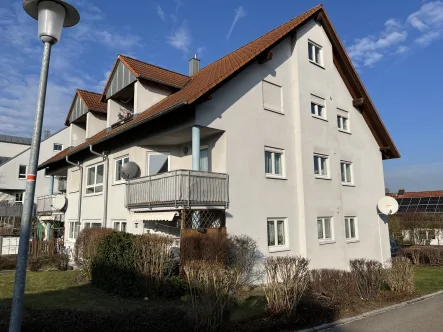 Ansicht - Wohnung kaufen in Schnelldorf - Vermietete 3-Zimmer-EG-Wohnung mit Süd-Terrasse und Stellplatz im idyllischen Schnelldorf 