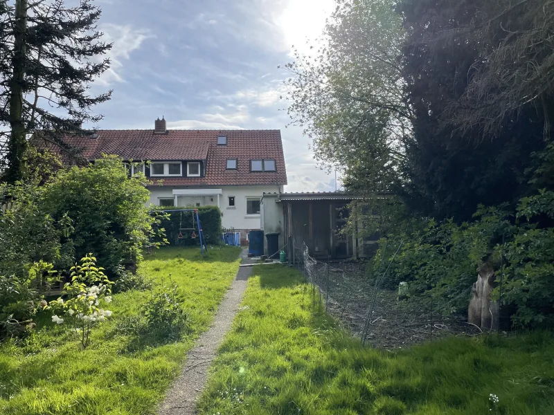 Titelbild - Haus kaufen in Nienstädt - Gemütliche Doppelhaushälfte in ruhiger und familienfreundlicher Lage von Nienstädt