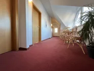 Lounge vor Gästezimmern