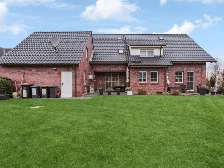 Rückansicht Haus - Haus kaufen in Recklinghausen - Repräsentatives, großzügiges und gepflegtes Einfamilienhaus in beliebter Lage von Recklinghausen