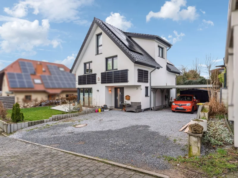 Titelbild - Haus kaufen in Bad Oeynhausen - Familien aufgepasst! Modernes Einfamilienhaus in beruhigter Wohnlage von Rehme