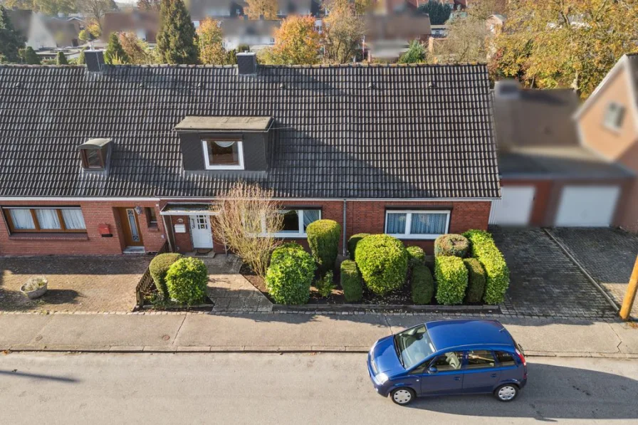 Titelbild - Haus kaufen in Lübeck - Viel Platz auf über 160 m² Wohnfläche + gepflegter, großzügiger Garten mit Erbpacht