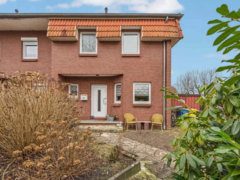 Frontansicht - Haus kaufen in Emden - Charmantes Reihenendhaus aus ca. 1992 in ruhiger Lage in Emden!