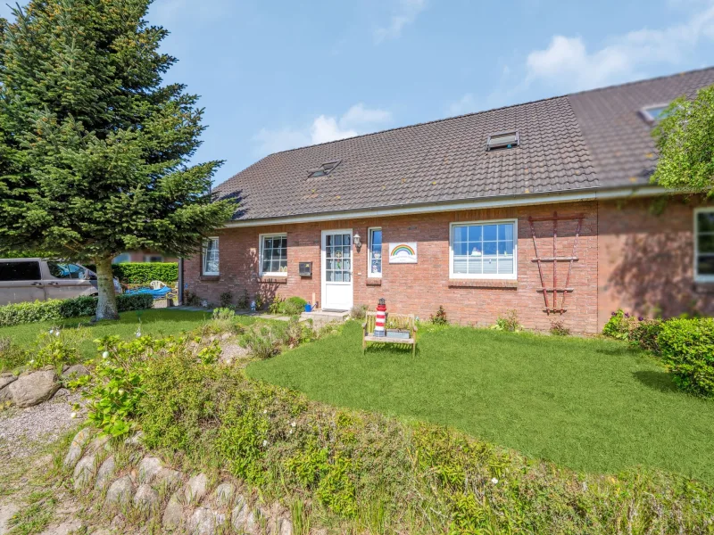 Hausansicht - Haus kaufen in Steinfeld - Familienfreundliche Doppelhaushälfte in Steinfeld